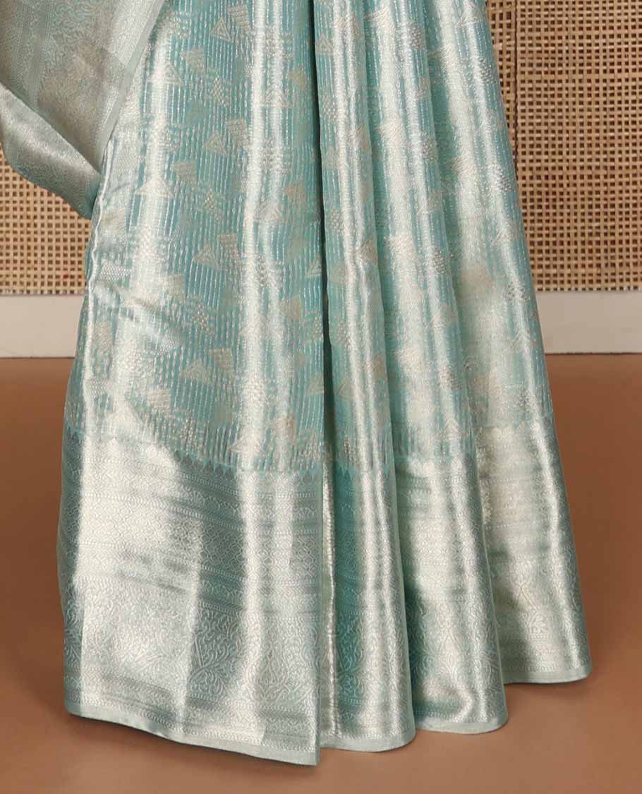 Blue jacquard tissue silk saree, intricate pallu & zari border of thilakam mokku,muthu,kathir, floral & then kuli kann