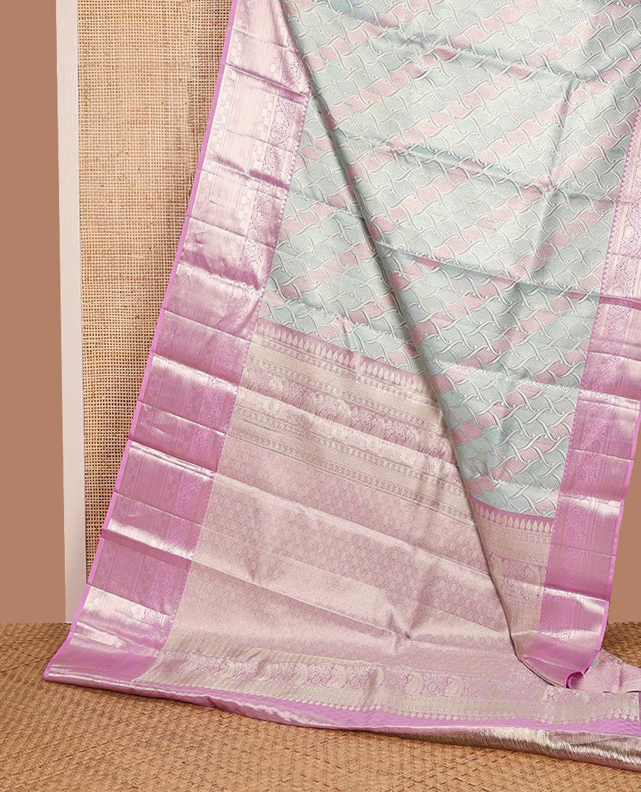 Blue Kanchipuram Tissue Silk Saree, Finely Crafted with Jacquard Design on Its Body, Complemented by a Contrast Border of Traditional Designs, Grand Jaal Decked Up Pallu, and Paired with a Contrast Blouse