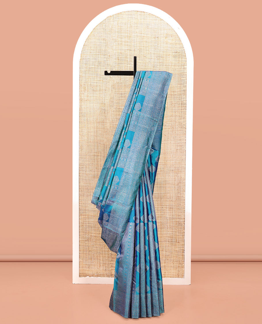 Blue Kanchipuram Designer Silk Saree, Subtly Enriched with Zari Designs Woven All Over Its Body, Highlighted by Zari Traditional Border, Zari Woven Pallu, and Paired with a Matching Blouse