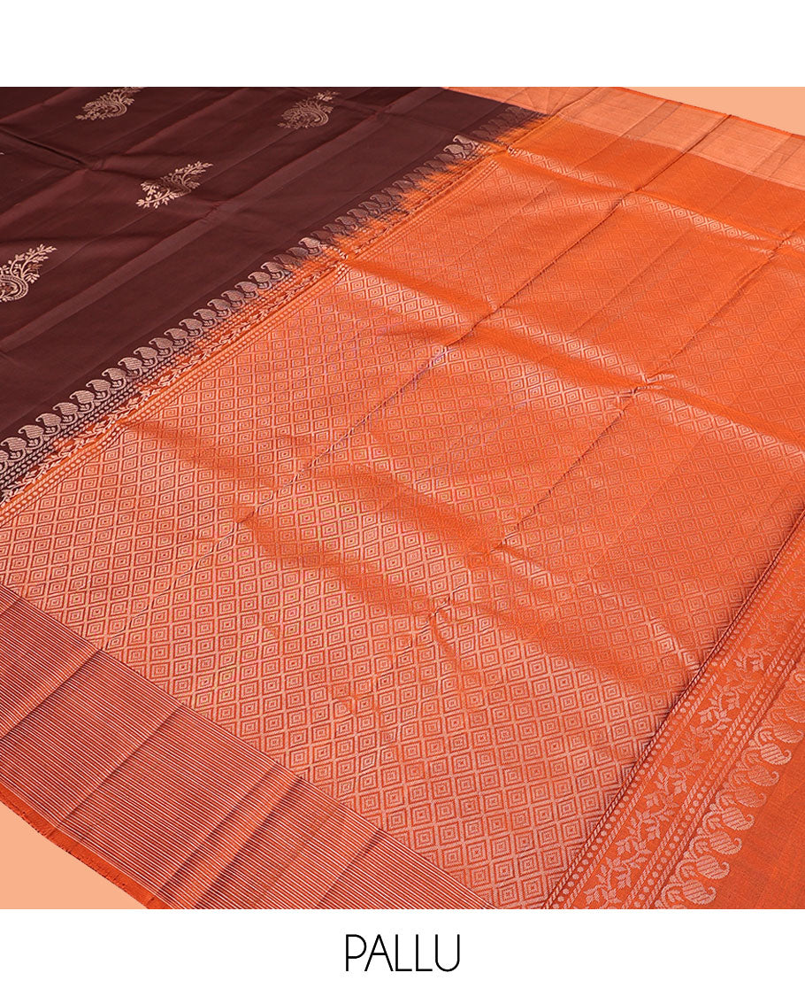 Brown Kanchipuram Silk Saree, Embellished with Floral Buttas, Complemented By Contrast Zari Border, Grand Jaal Pallu, and a Contrast Blouse