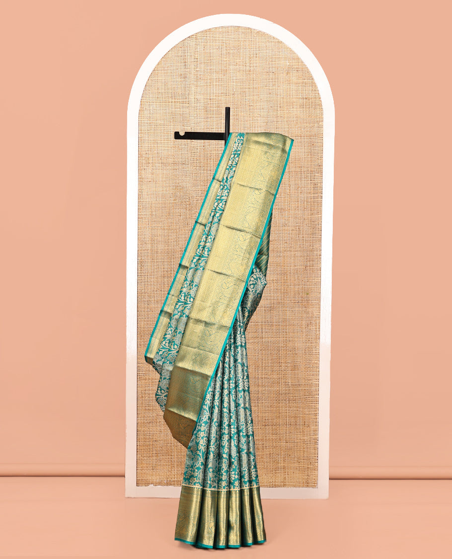 Blue Kanchipuram Tissue Silk Saree, Enriched with Floral Jacquard, a Zari Border of Thilakam Mokku, Jaal, and Manga Designs, Diagonal Striped Pallu, and Matching Blouse
