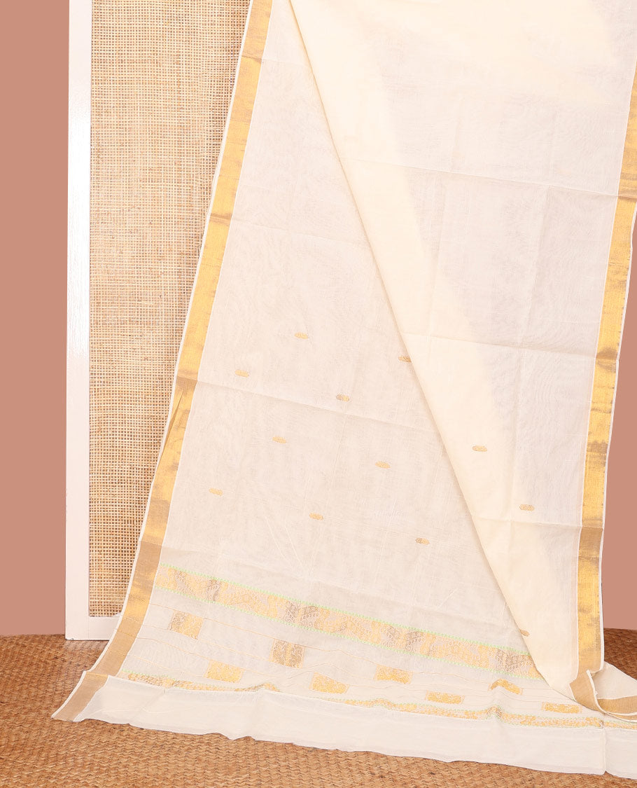 Cream Kerala Saree, Enriched with Zari Buttas on Its Body, Subtly Sparkled Bavanji Border, Pallu Woven in Zari Peacock Designs, and Paired with a Matching Blouse