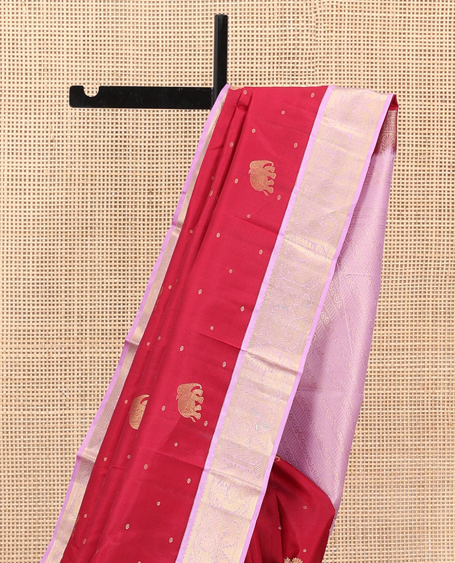 Pink Vasundhara Silk Saree Elevated with Yaanai and Mayil Buttas, Complemented by a Contrast Border of Muthu, Kathir, Mayil, and Yaanai Designs, Pallu Embellished with Diagonal Stripes, and Paired with a Contrast Blouse