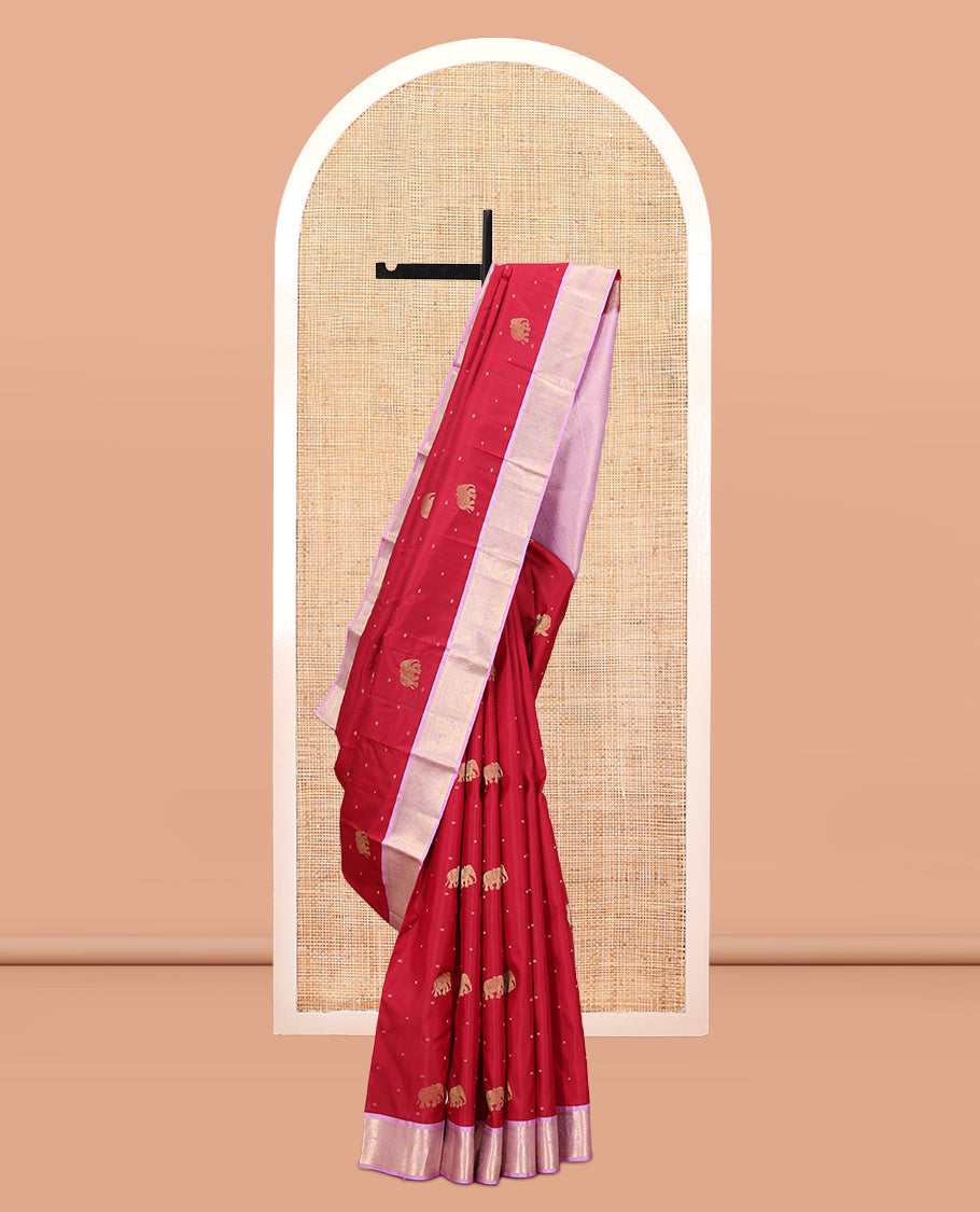Pink Vasundhara Silk Saree Elevated with Yaanai and Mayil Buttas, Complemented by a Contrast Border of Muthu, Kathir, Mayil, and Yaanai Designs, Pallu Embellished with Diagonal Stripes, and Paired with a Contrast Blouse