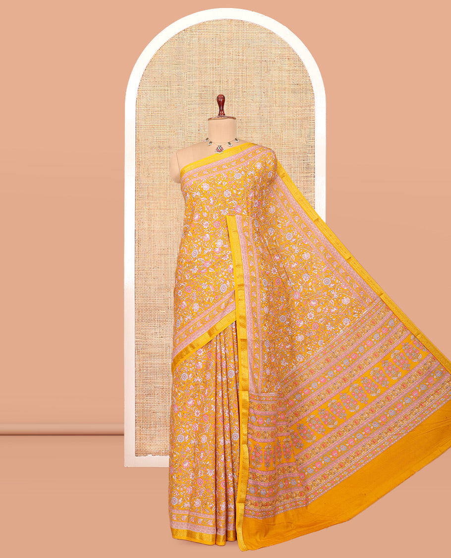 Yellow Printed Silk Saree, Adorned with Floral Vine Print, a Traditional Zari Border, Floral Pallu, and a Matching Blouse
