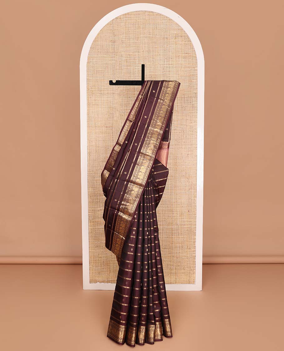 Brown zari design silk saree, zari border of thilakam mokku, banaras, poun, and mayil designs, and zari striped pallu