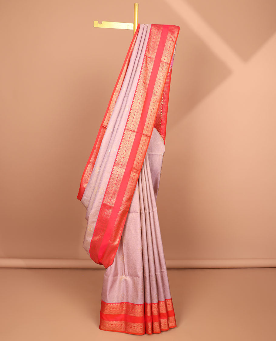 Mauve floral buttas soft silk saree with contrast intricate zari design border & floral , striped design pallu