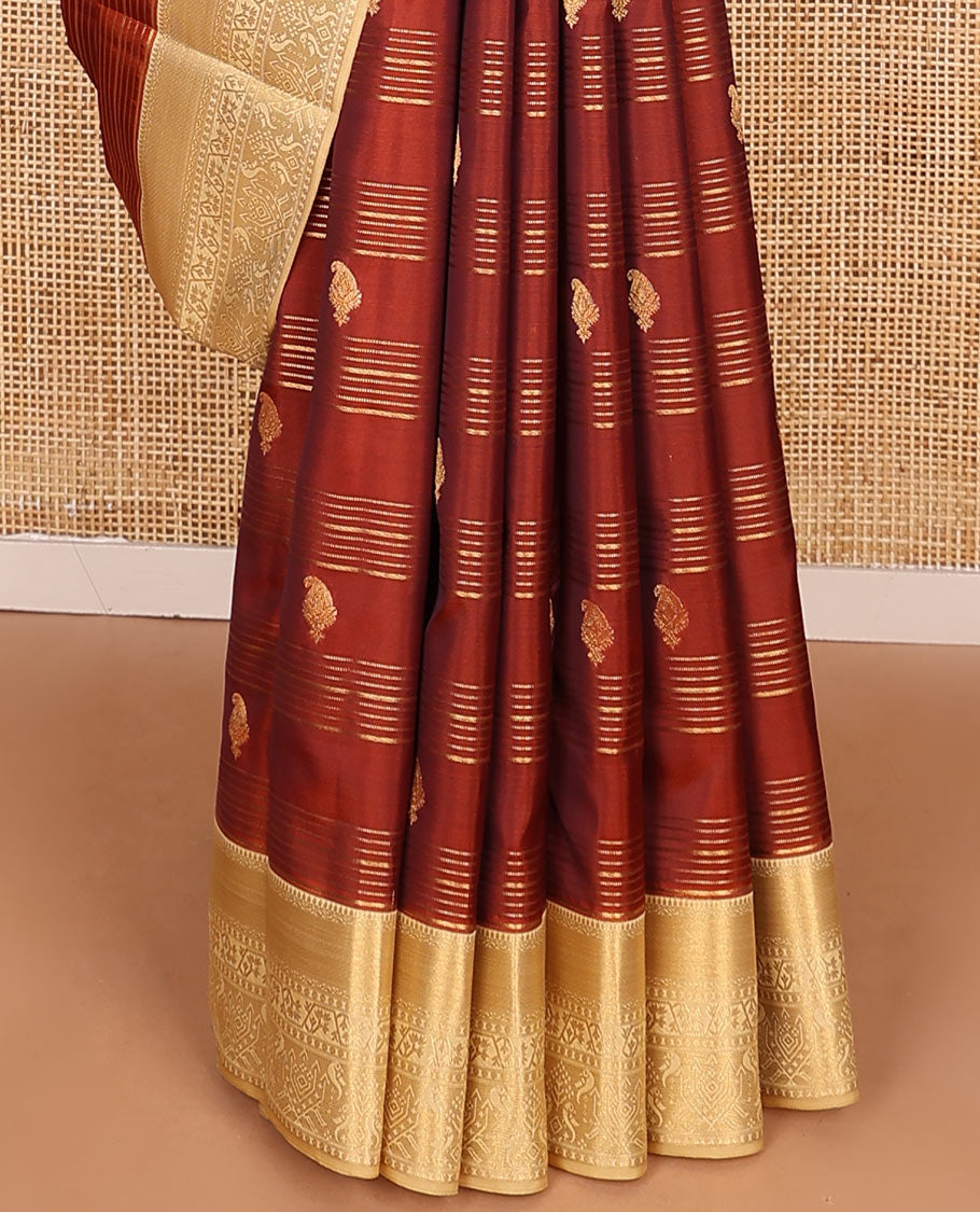 Orange Vasundhara Lite-Silk Mix Saree Decorated with Zari Stripes and Manga Buttas, Complemented by a Paithani-Themed Zari Woven Contrast Border, Pallu Elevated with Thilakam Motifs, and Comes with a Contrast Blouse