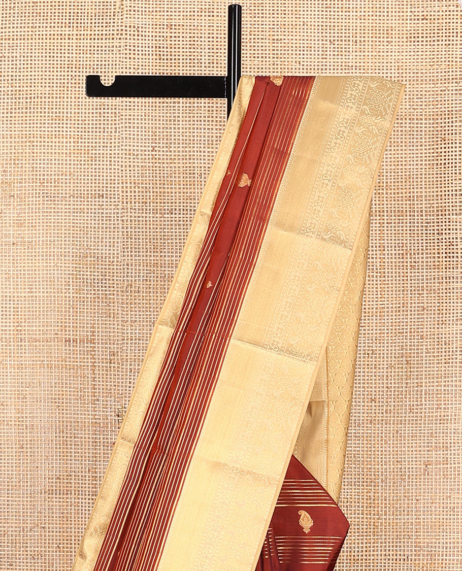 Orange Vasundhara Lite-Silk Mix Saree Decorated with Zari Stripes and Manga Buttas, Complemented by a Paithani-Themed Zari Woven Contrast Border, Pallu Elevated with Thilakam Motifs, and Comes with a Contrast Blouse