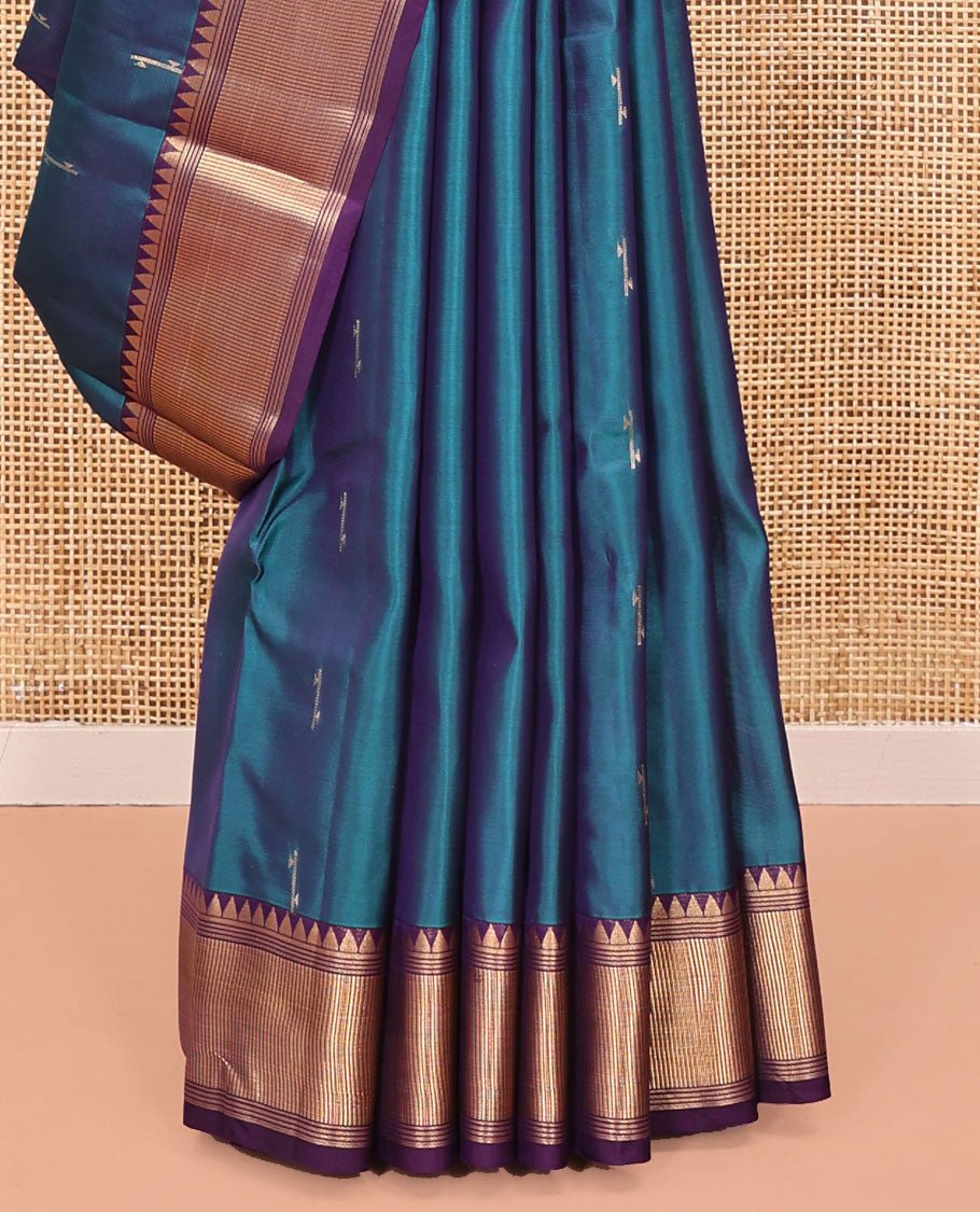 Blue Vasundhara Lite Silk Mix Saree, Sparsely Woven with Zari Buttas All Over Its Body, Complemented by a Contrast Temple Border, Grandly Decked Up Pallu, and Paired with a Contrast Blouse