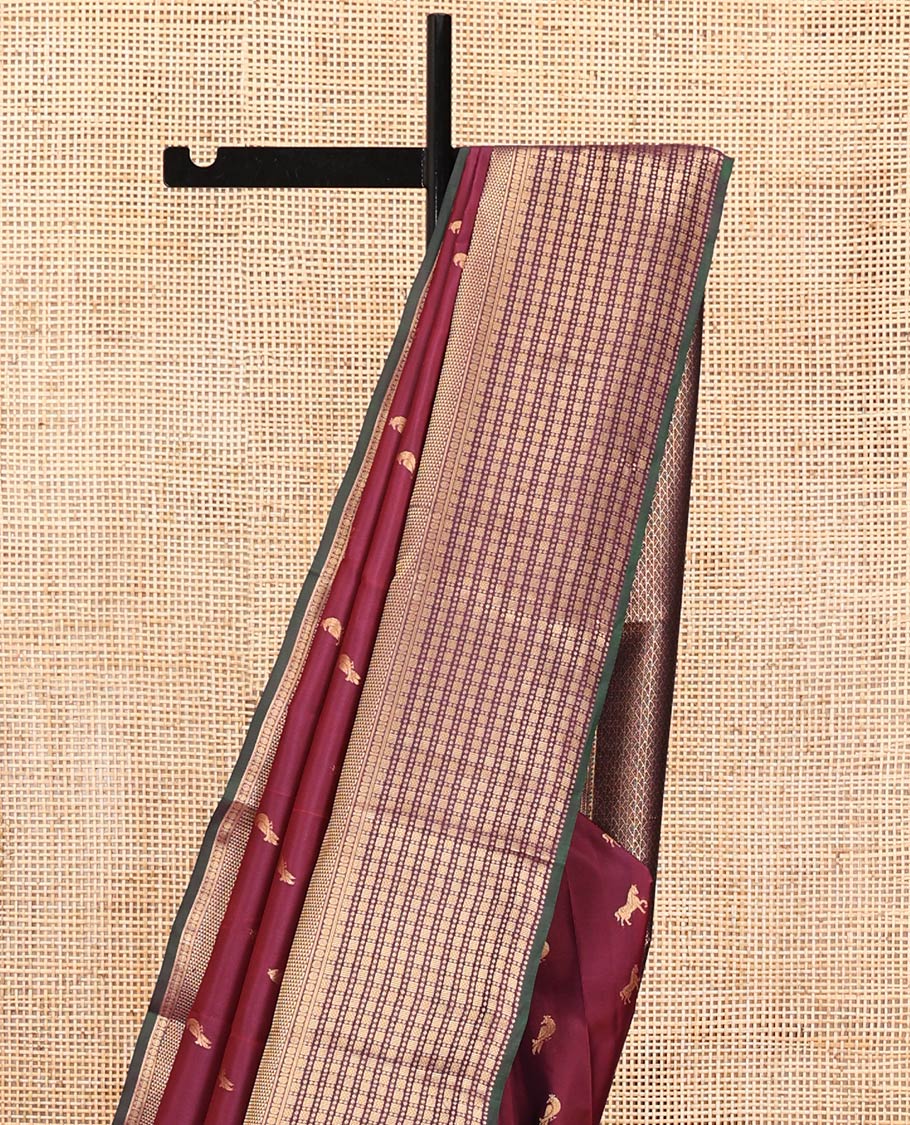 Maroon Vasundhara Lite Silk Mix Saree, Embellished with Zari Buttas All Over Its Body, Complemented by Contrast Border of Rekku, Kathir, Poun, Ara Maadam, and Geometric Patterns, Grand Pallu and Paired with a Contrast Blouse