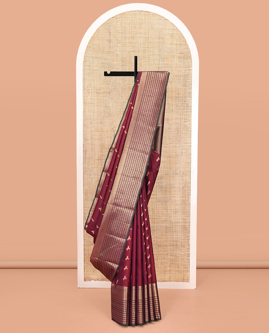 Maroon Vasundhara Lite Silk Mix Saree, Embellished with Zari Buttas All Over Its Body, Complemented by Contrast Border of Rekku, Kathir, Poun, Ara Maadam, and Geometric Patterns, Grand Pallu and Paired with a Contrast Blouse