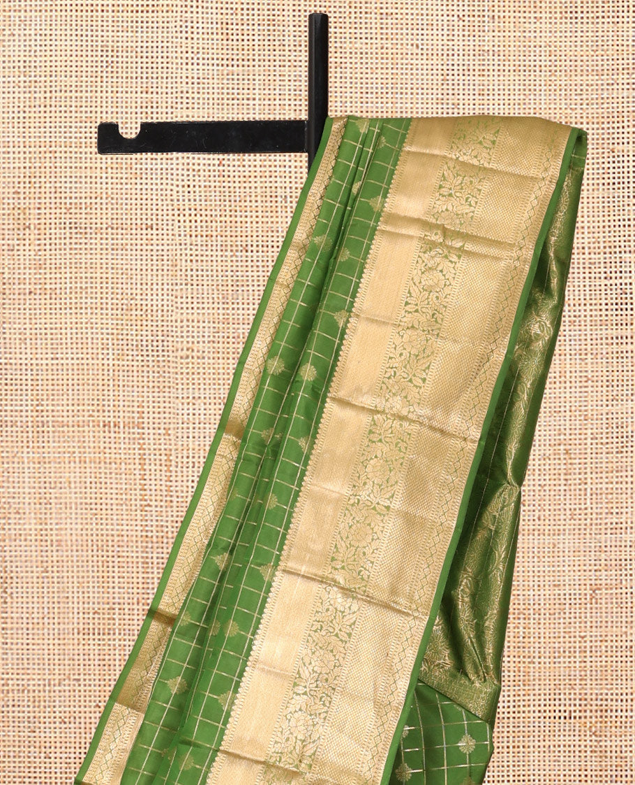 Green Vasundhara Lite Silk Mix Saree, Ornamented with Zari Buttas and Checks, a Zari Border of Thilakam, Kodi Visiry, and Kuyil Kann Designs, Grand Pallu, and a Matching Blouse
