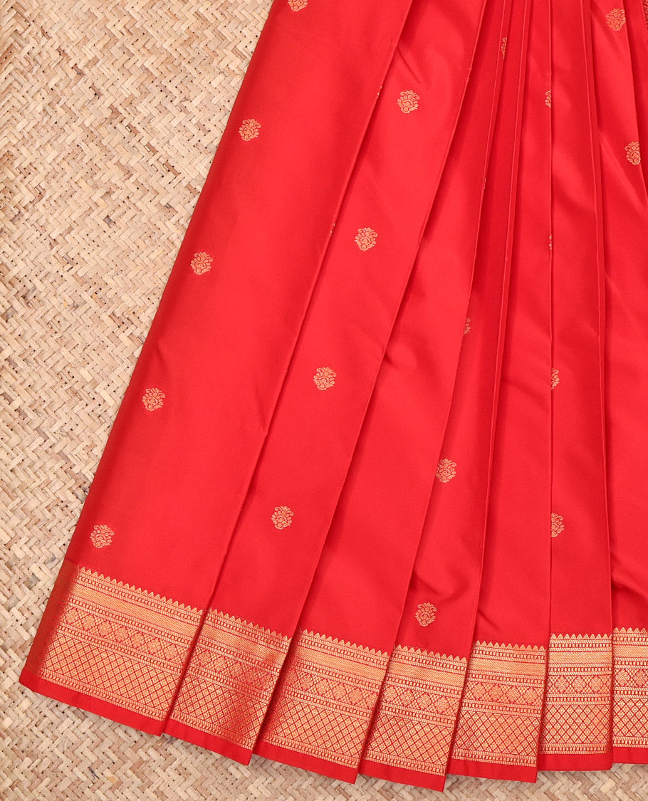 Red Budget Silk Saree, Spotlighted with Zari Buttas, Highlighted by a Traditional Zari Border, Intricate Pallu, and a Matching Blouse