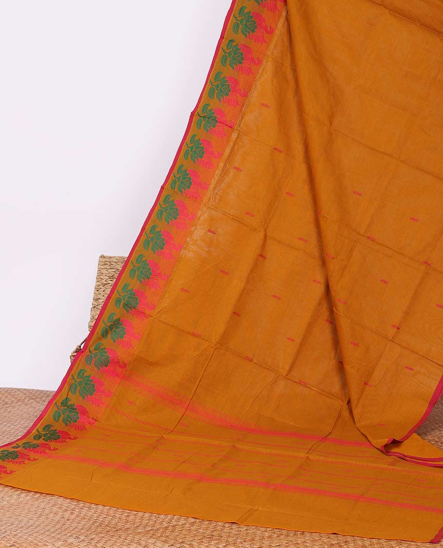 Orange buttas Chettinad cotton saree, floral motif border & striped pallu