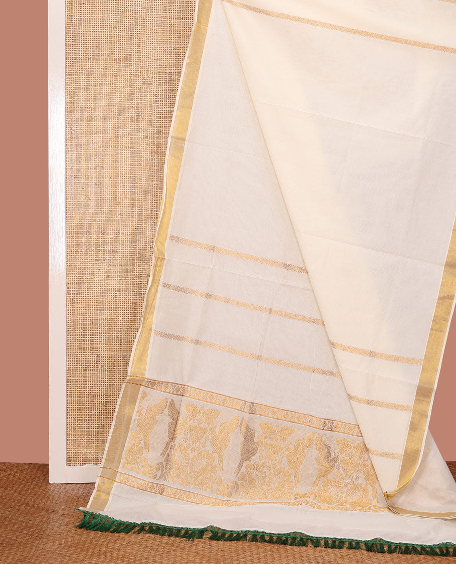 Cream Kerala Saree, Showcasing with Zari Stripes on Its Body, Bavanji Zari Border, Artfully Zari Woven Pallu of Bird and Floral Designs, and Paired with a Matching Blouse