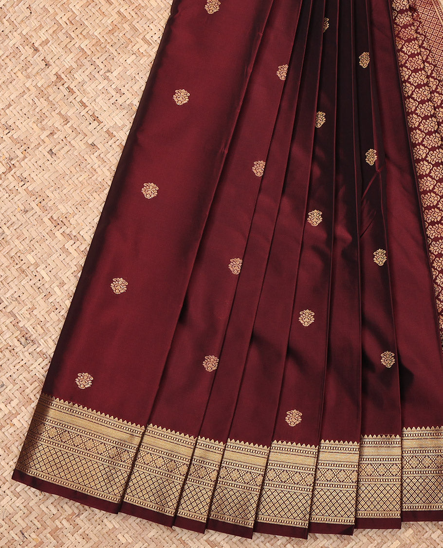 Maroon Budget Silk Saree, Delicately Woven with Zari Buttas, Highlighted by a Traditional Zari Border, Intricate Pallu, and a Matching Blouse
