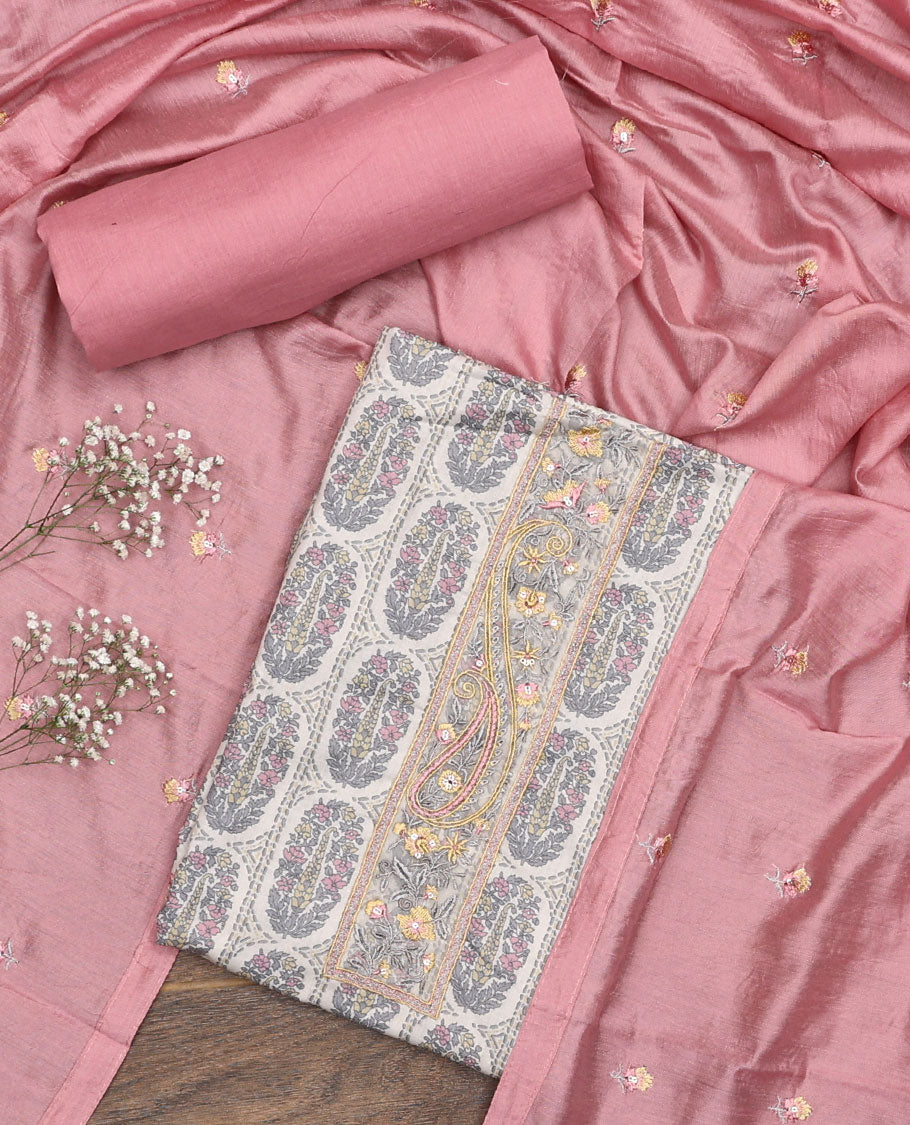 Pink material chudidar set, intricately printed with neck work top, plain bottom, and floral motifs embroidered dupatta