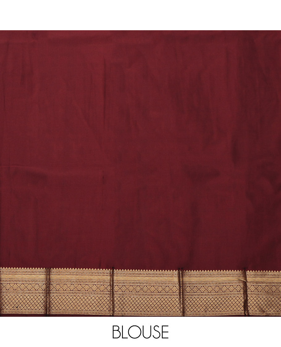 Maroon Budget Silk Saree, Delicately Woven with Zari Buttas, Highlighted by a Traditional Zari Border, Intricate Pallu, and a Matching Blouse