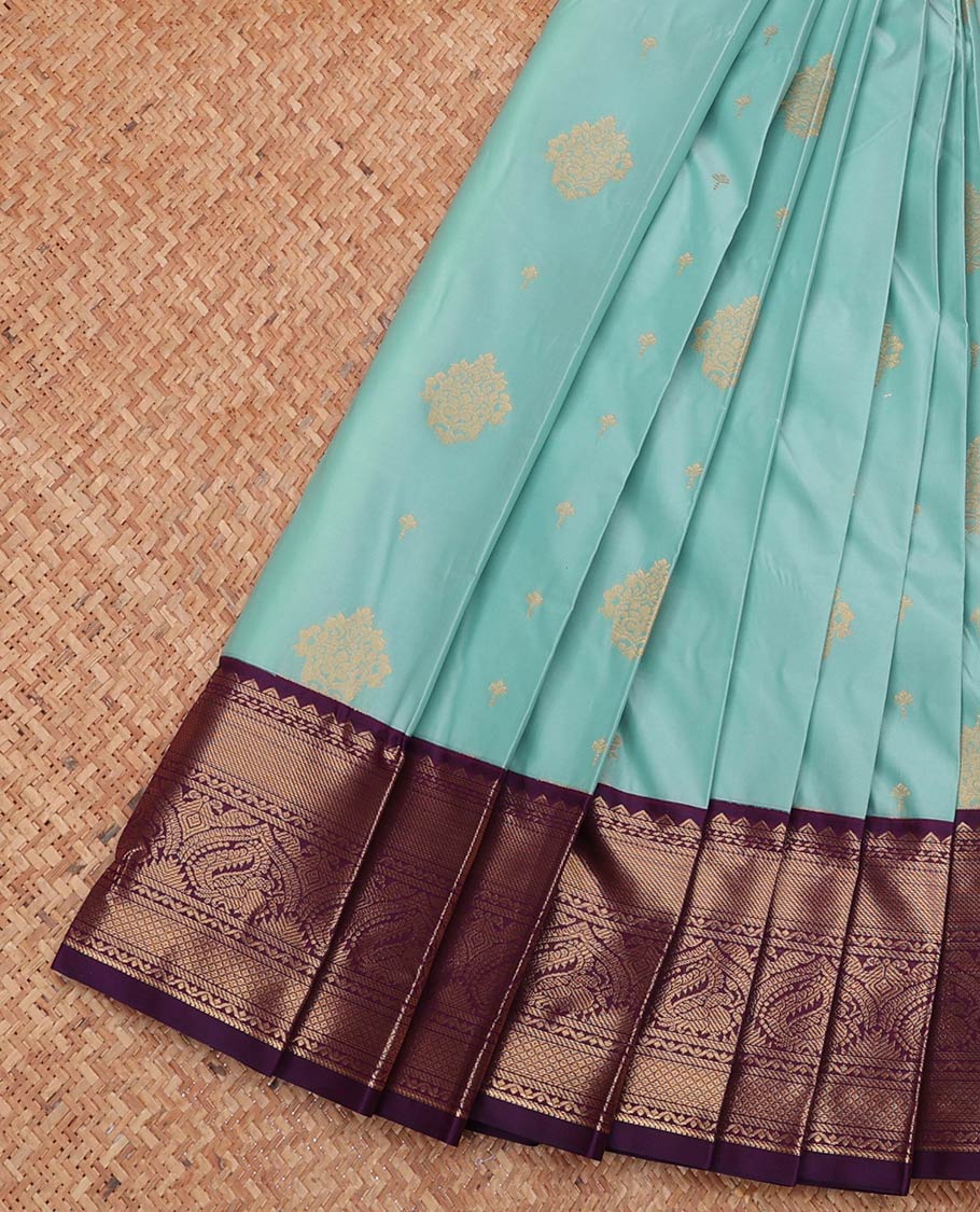 Pale Blue Budget Silk Saree, Subtly Sparkled with Zari Buttas, Complemented by a Contrast Traditional Zari Border, Jaal Pallu, and a Contrast Blouse