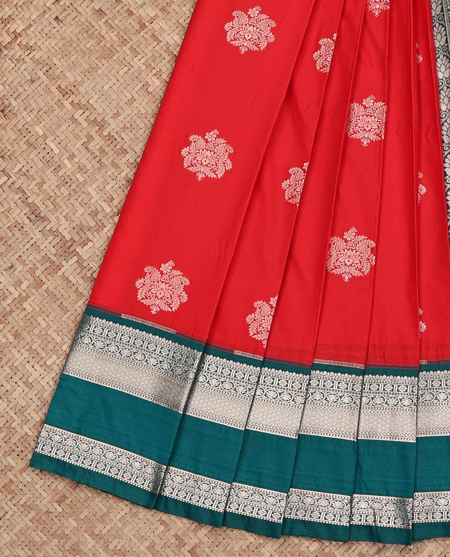 Red Budget Silk Saree, Adorned with Zari Buttas on Its Body, Complemented by a Contrast Traditional Zari Design Rettai Pettu Border, Intricately Designed Pallu, and Paired with a Contrast Blouse