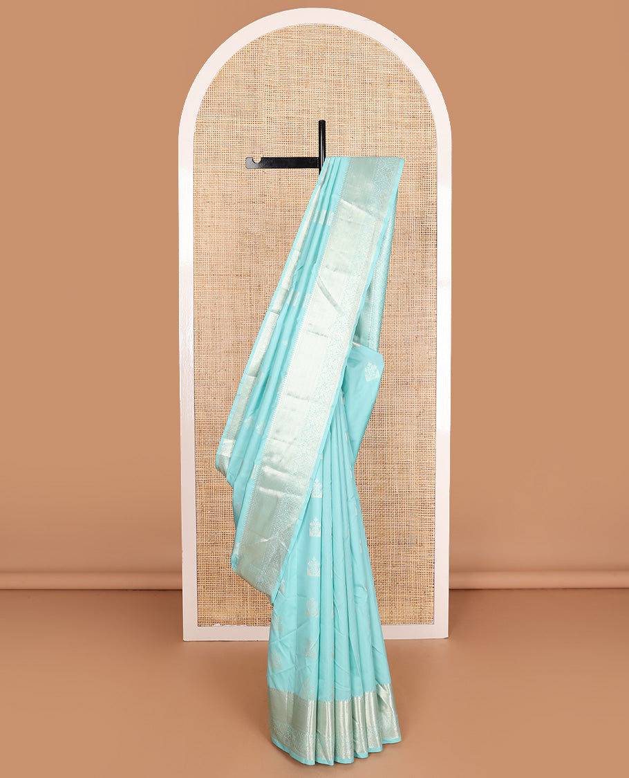 Blue zari buttas Vasundhara silk mix, zari border of rekku, muthu, kathir, mayil, and kodi visiry, and intricate pallu