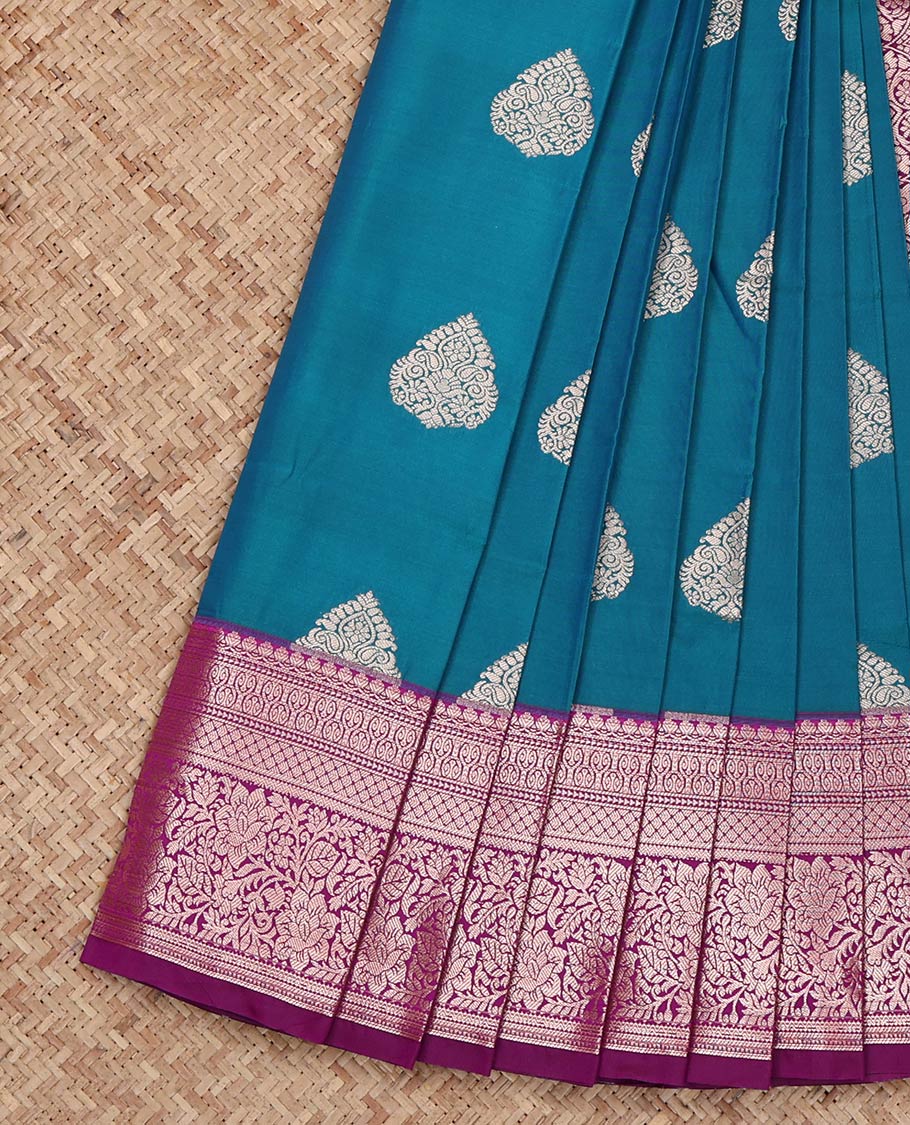 Peacock Blue Budget Silk Saree, Enriched with Zari Buttas on Its Body, Complemented by a Contrast Traditional Zari Design Border, Intricately Designed Pallu, and Paired with a Contrast Blouse
