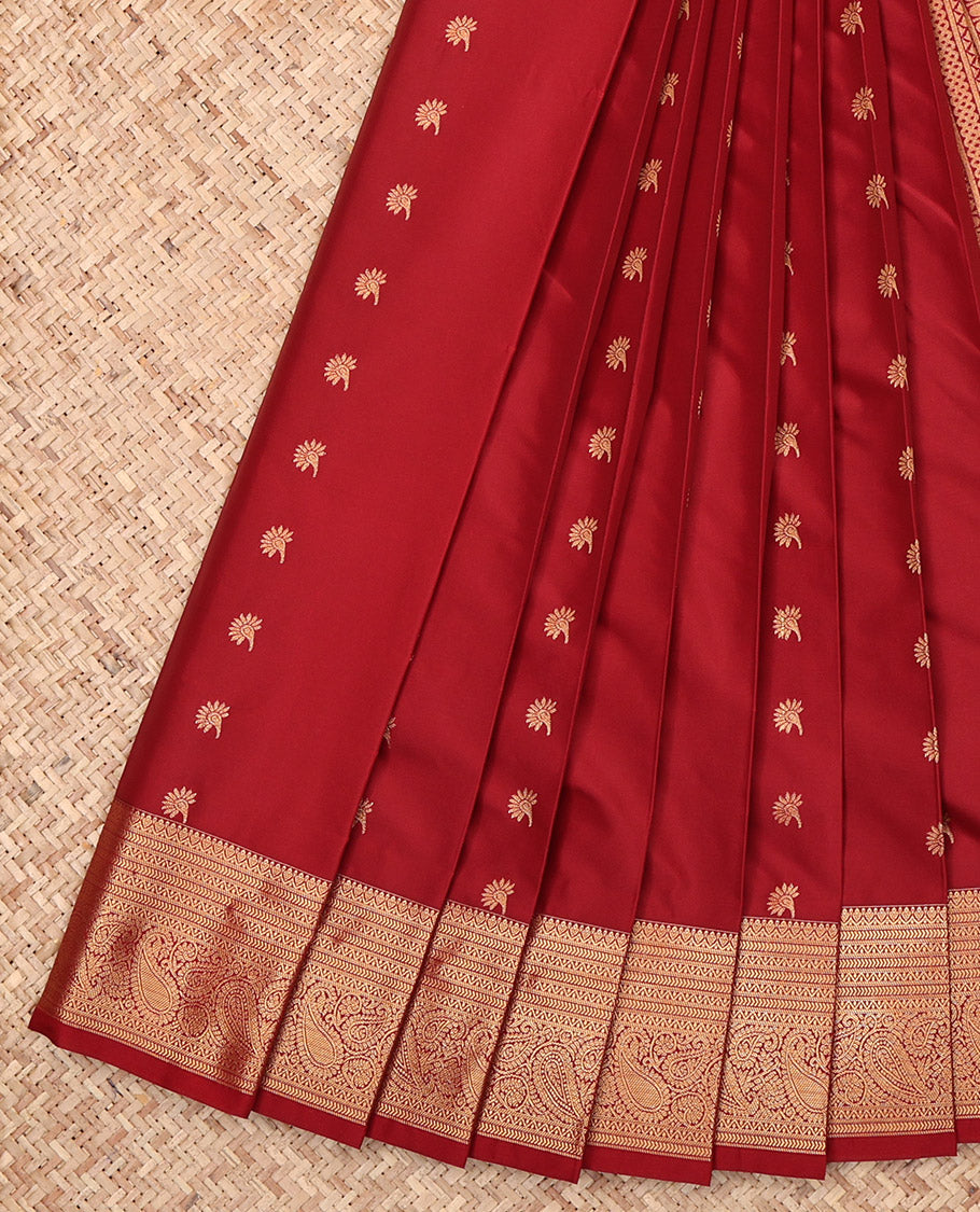 Red Budget Silk Saree, Decked Up with Zari Buttas, Highlighted by a Traditional Zari Border, Intricate Pallu, and a Matching Blouse