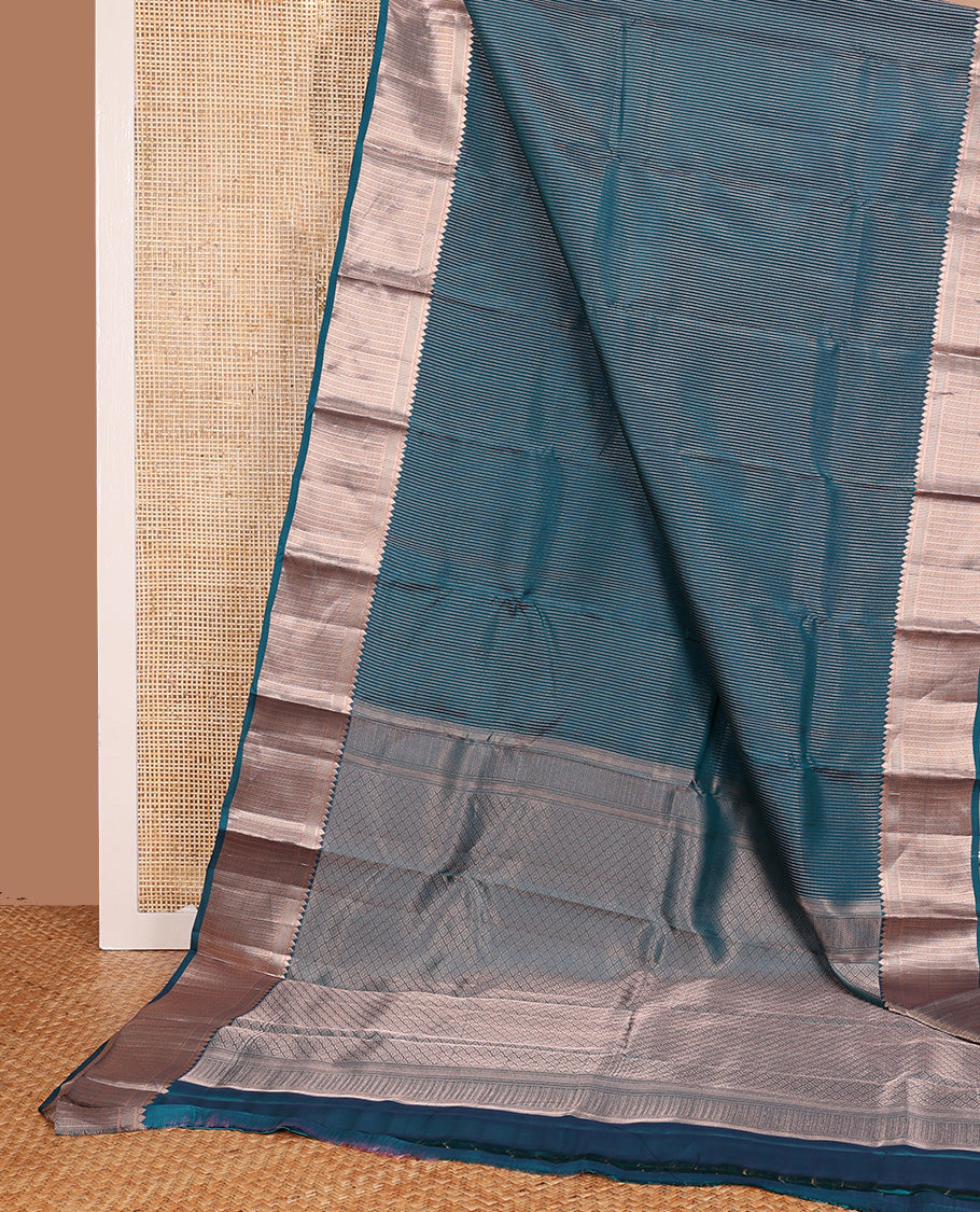 Blue muthu striped Vasundhara silk mix, zari border of thilakam, kathir, and banaras designs, and jaal pallu