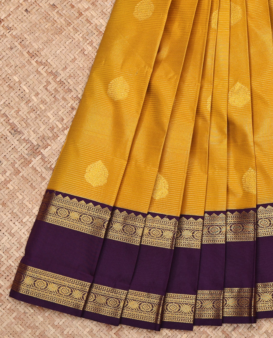 Yellow Budget Silk Saree, Subtly Sparkled with Zari Buttas and Stripes on Its Body, Complemented by a Contrast Traditional Zari Design Rettai Pettu Border, Grand Jaal-Patterned Pallu, and Paired with a Contrast Blouse