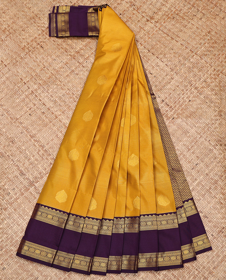 Yellow Budget Silk Saree, Subtly Sparkled with Zari Buttas and Stripes on Its Body, Complemented by a Contrast Traditional Zari Design Rettai Pettu Border, Grand Jaal-Patterned Pallu, and Paired with a Contrast Blouse