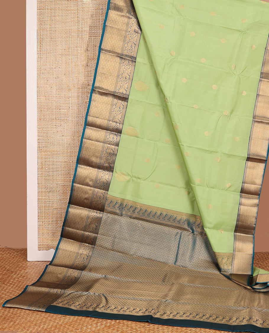 Green zari buttas Vasundhara silk mix, contrast border of traditional designs, and jaal pallu