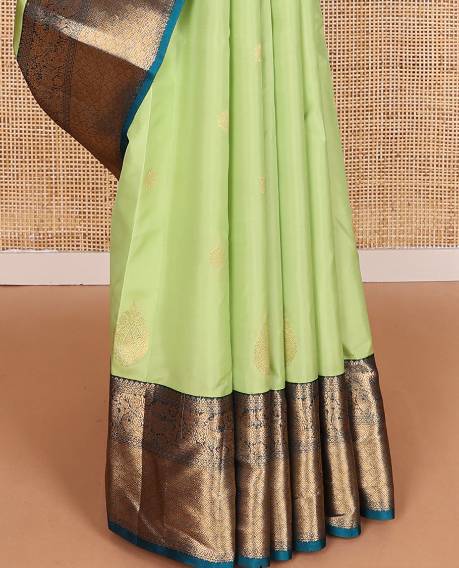 Green zari buttas Vasundhara silk mix, contrast border of traditional designs, and jaal pallu