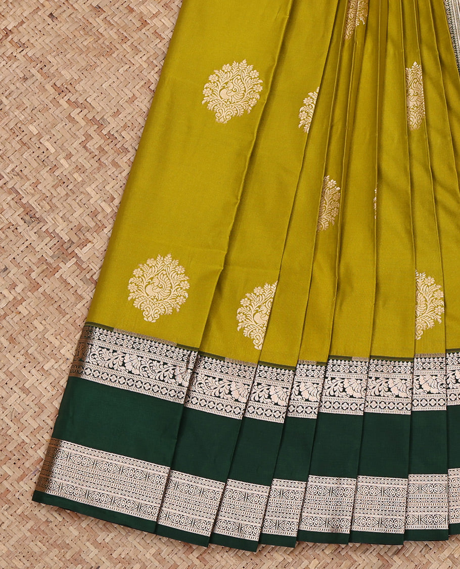 Green Budget Silk Saree, Graced with Zari Buttas All Over Its Body, Complemented by a Contrast Traditional Zari Design Rettai Pettu Border, Intricate Pallu, and Paired with a Contrast Blouse