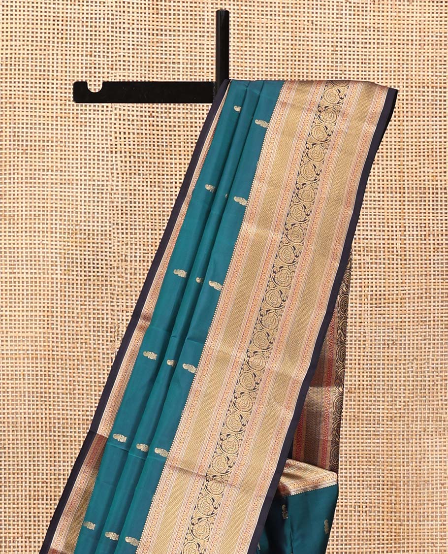 Blue Vasundhara Lite Silk Saree, Graced with Zari Buttas All Over Its Body, Complemented by Contrast Border of Mayil Kann and Dhavana Kodi Designs, Grand Jaal Pallu and Paired with a Contrast Blouse