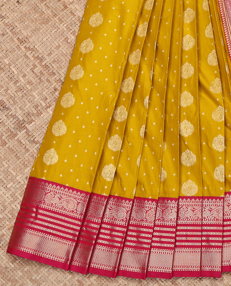 Yellow Budget Silk Saree, Accentuated with Zari Buttas on Its Body, Complemented by a Contrast Traditional Zari Border of Peacock Designs, Grand Pallu, and Paired with a Contrast Blouse