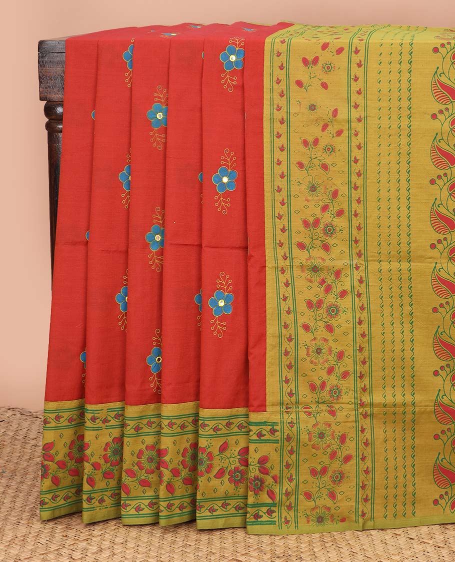Red floral motifs printed poly cotton saree, contrast floral creeper border, and pallu of leaf creeper design