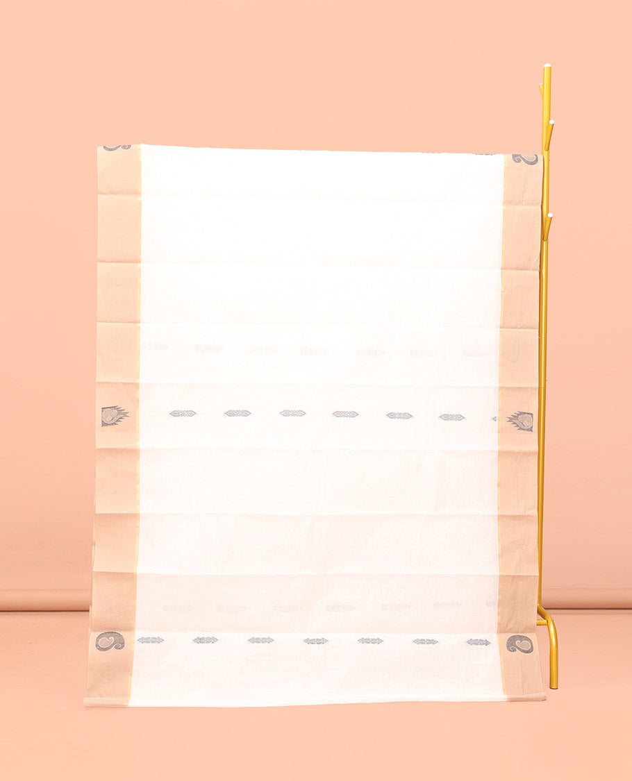 White Kanchi Cotton Saree, Crafted with Buttas All Over Its Body, a Complemented by Contrast Temple Border, Pallu of Tree Designs, and Paired with a Matching Blouse
