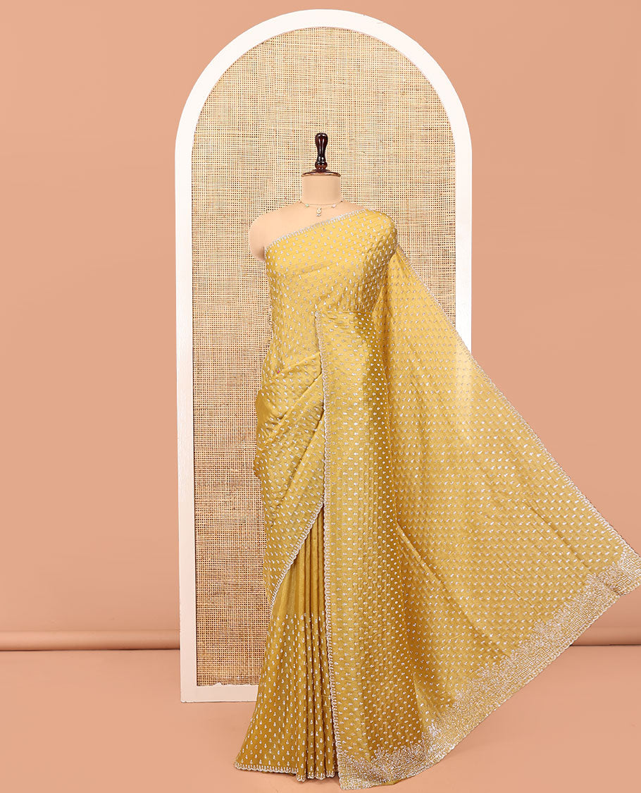Mustard Designer Saree, Spotlighted with Stone Work All Over Its Body, Intricately Stone Woven Pallu, and Paired with a Matching Blouse