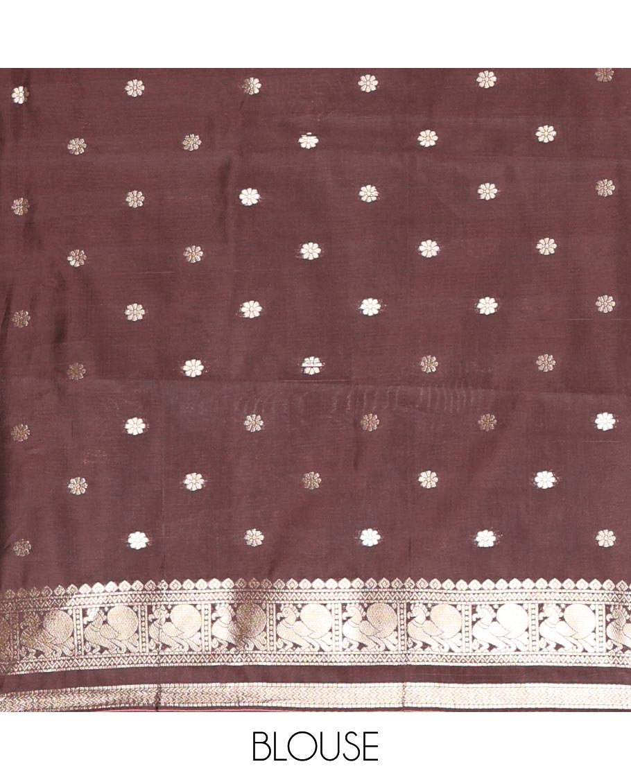 Coffee Brown Litchi Silk Saree, Richly Detailed with Peacock Buttas All Over Its Body, Highlighted by a Traditional Zari Border of Peacock Designs, Grand Pallu of Butta Enclosed Zari Checks, and Paired with a Matching Blouse