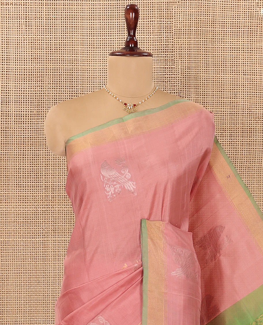 Pink Uppada Silk Saree Adorned with Parrot Zari Buttas, Complemented by Bavanji Border, Contrast Pallu Steeped with Parrot Zari Designs, and Paired with a Contrast Blouse
