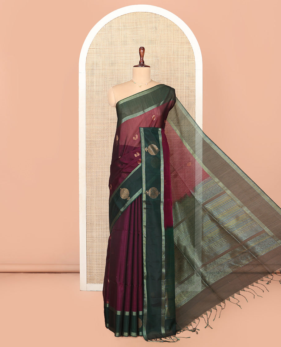 Maroon Silk Cotton Saree, Artfully Woven with Peacock and Rudraksham Motifs On Its Body, Complemented by Contrast Zari Motifs Woven Border, Geometric Zari Patterned Pallu and Paired with a Contrast Blouse