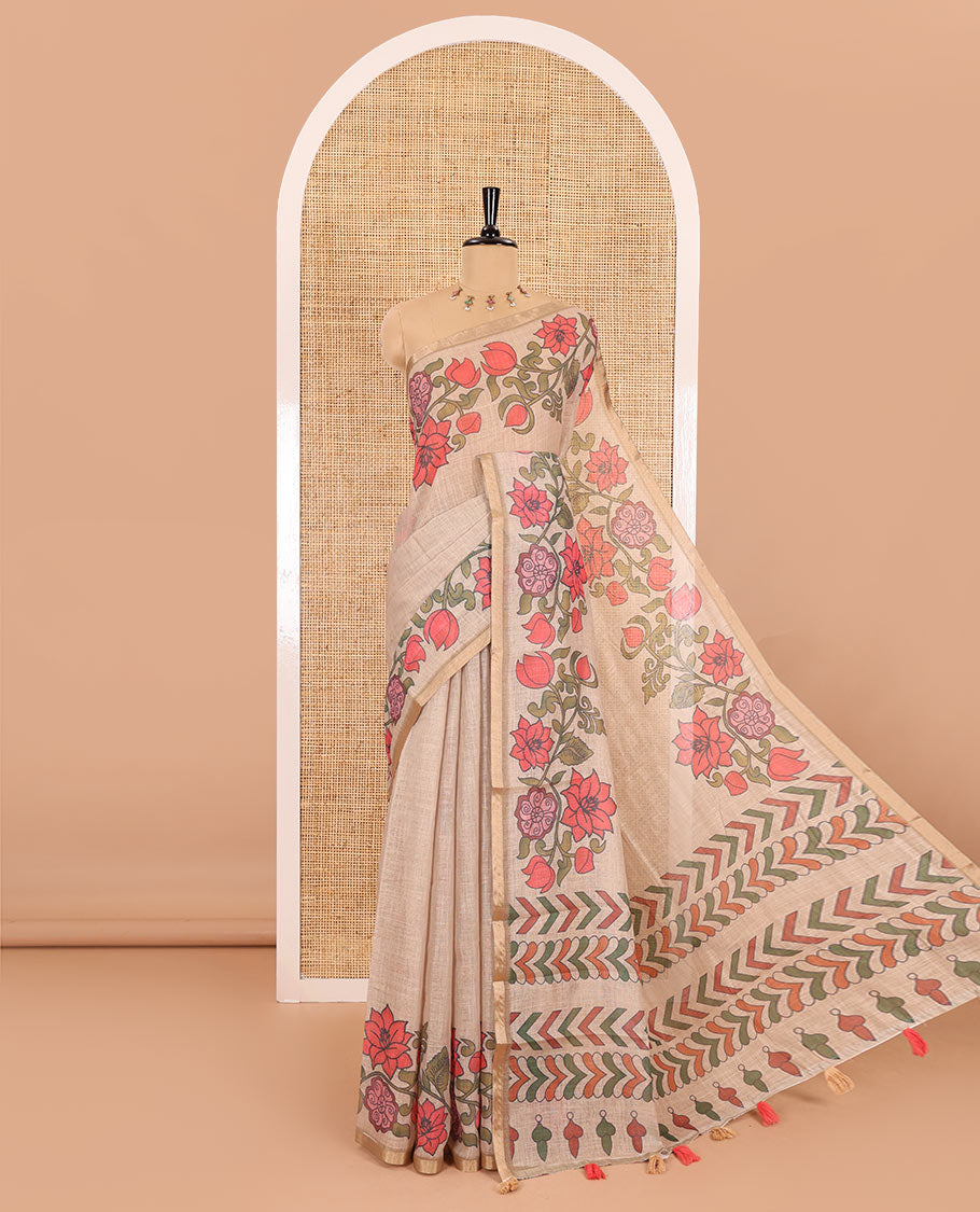 Chikku plain linen cotton saree, floral creeper printed zari piping border, geometric printed pallu, and lotus printed blouse
