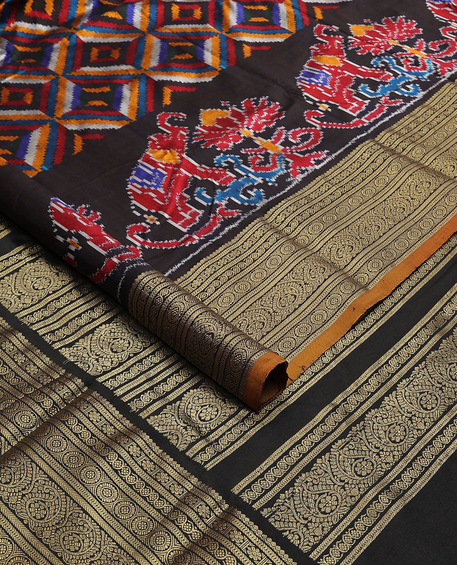 Black geometric, floral & animal design ikkat saree with contrast zari design border & traditional zari design pallu