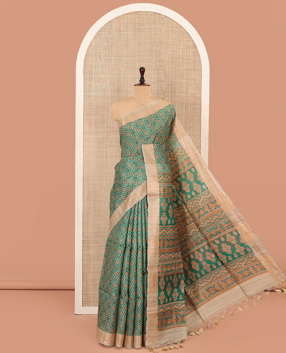 Green Tussar Silk Saree Beautified with Bandhani Dots Printed All Over Its Body, Complemented by Contrast Border, Pallu of Intricate Print, and Paired with a Contrast Blouse