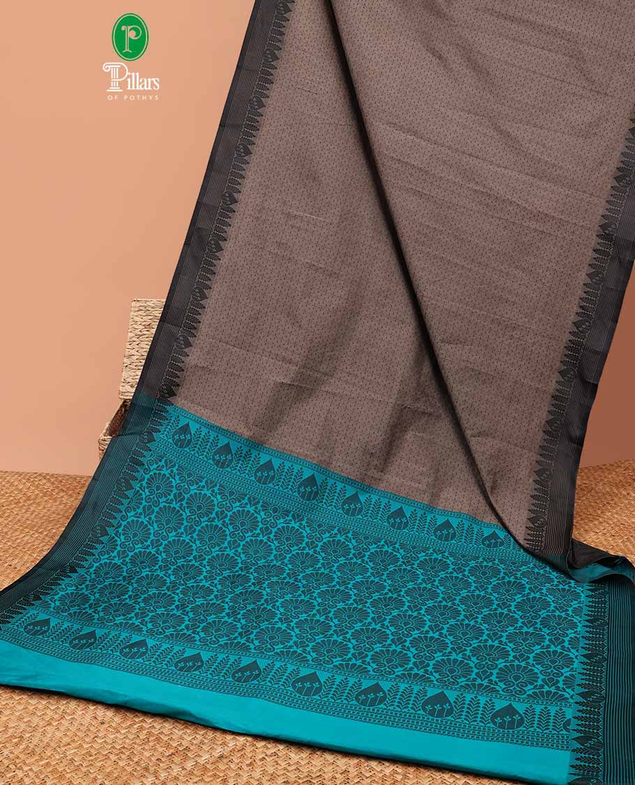 Dark grey geometric design silk saree with contrast striped,floral design border & intricate floral design pallu along with contrast blouse