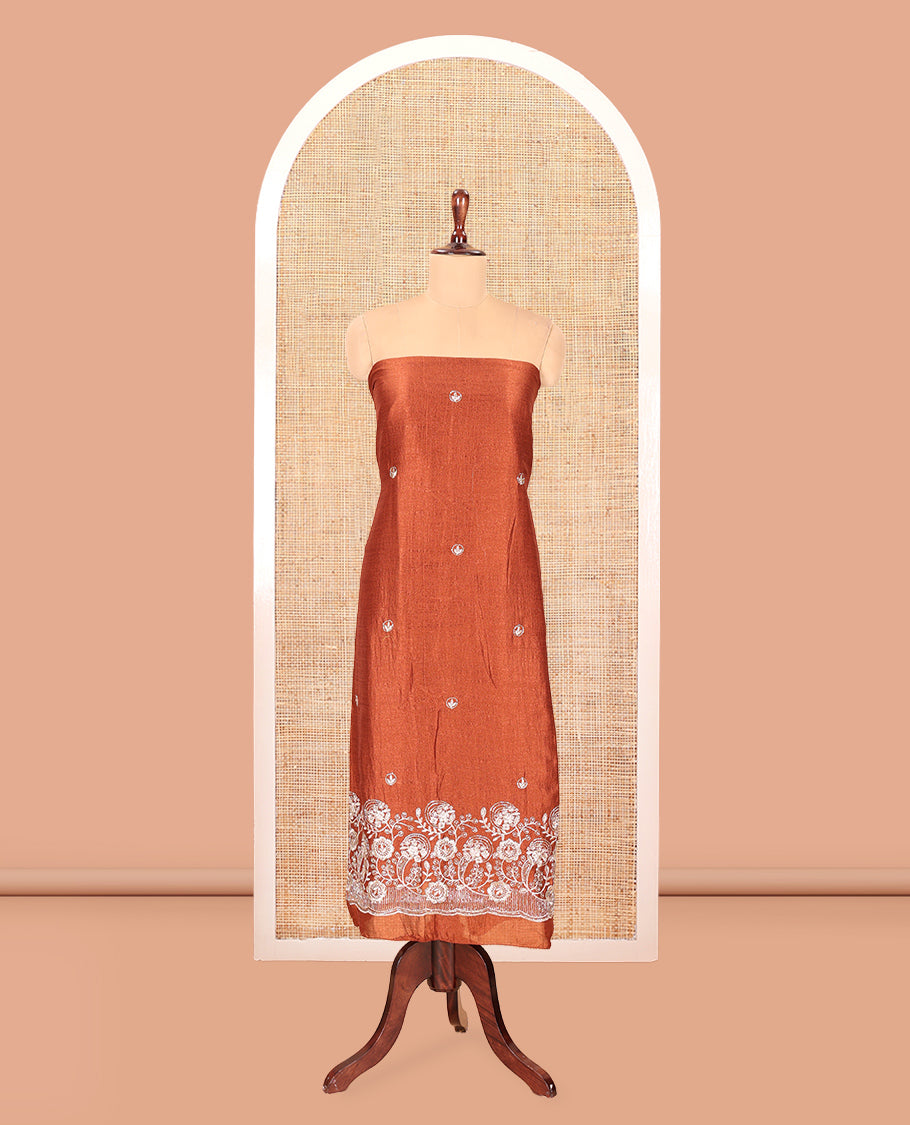 Rust Semi-Silk Material Churidar Features a Floral Embroidered Top, a Matching Bottom, Embroidered Dupatta