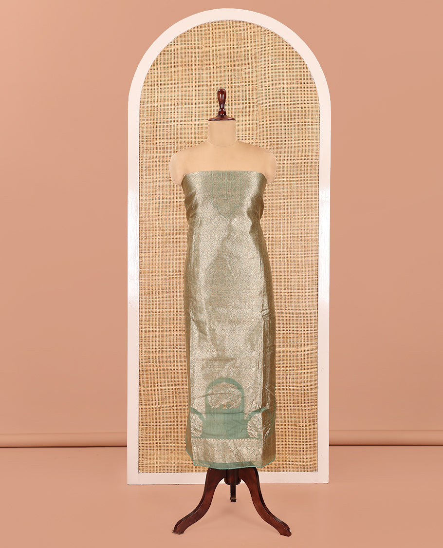 Green Banarasi Material Chudidar Features Jacquard Top, a Matching Santoon Bottom, and an Intricately Designed Dupatta