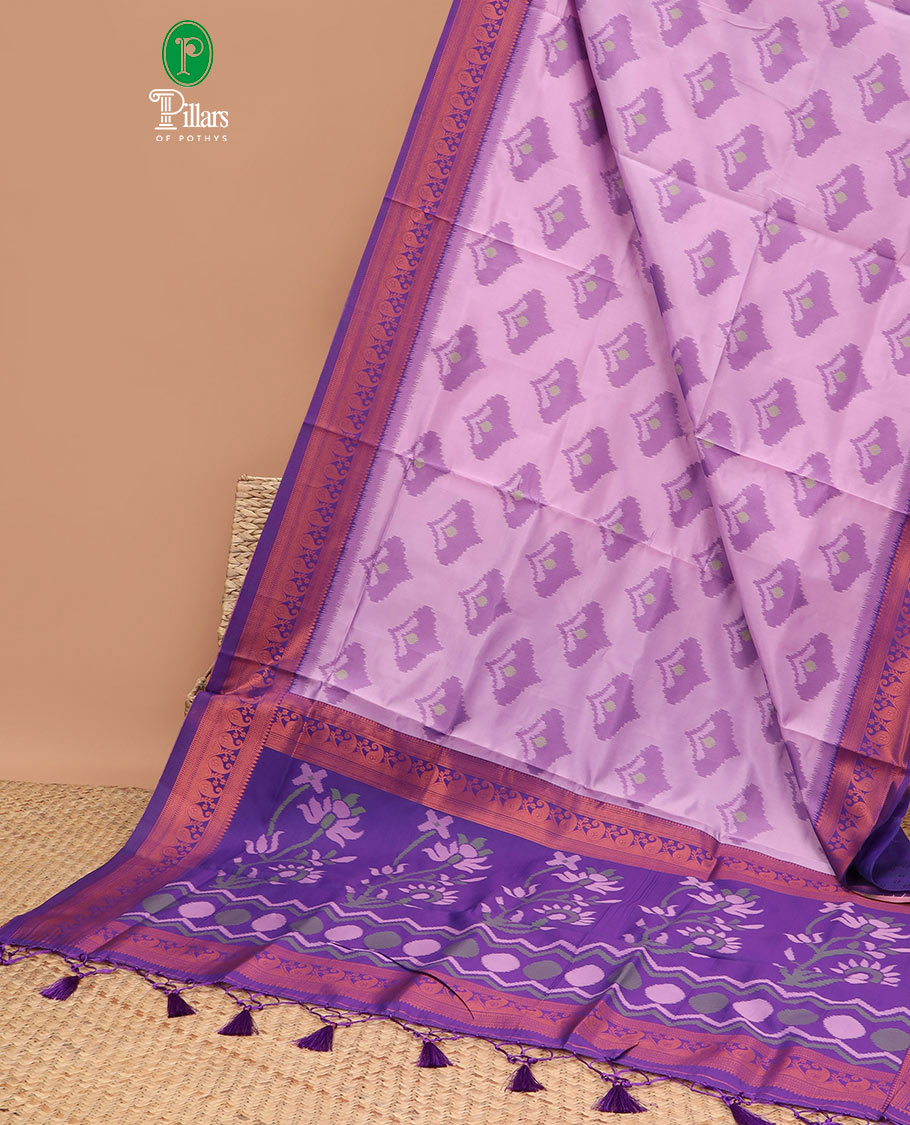 lavender pattola design mulberry silk saree with carry, zari design border & self empose with fancy tissue blouse