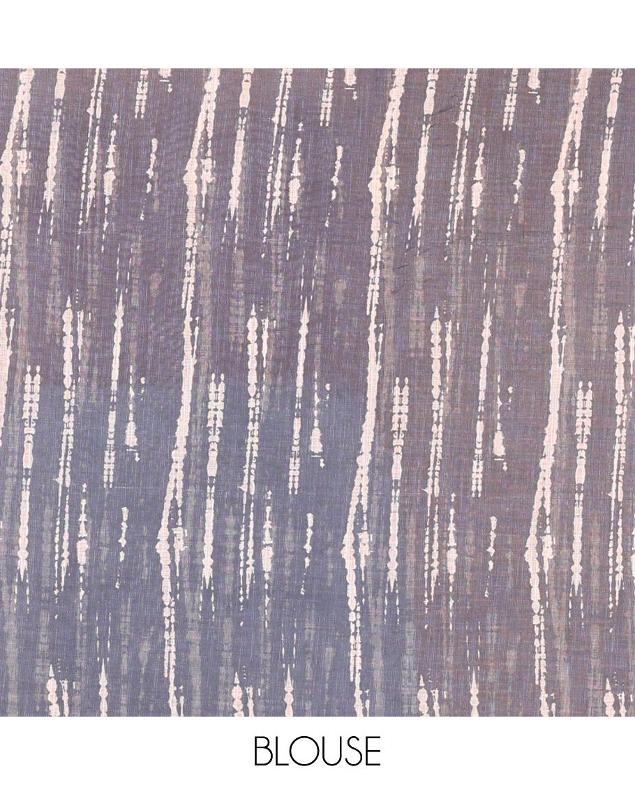 Peach shibori printed linen cotton saree, contrast piping zari border, shibori circle printed pallu, and a contrast shibori printed blouse